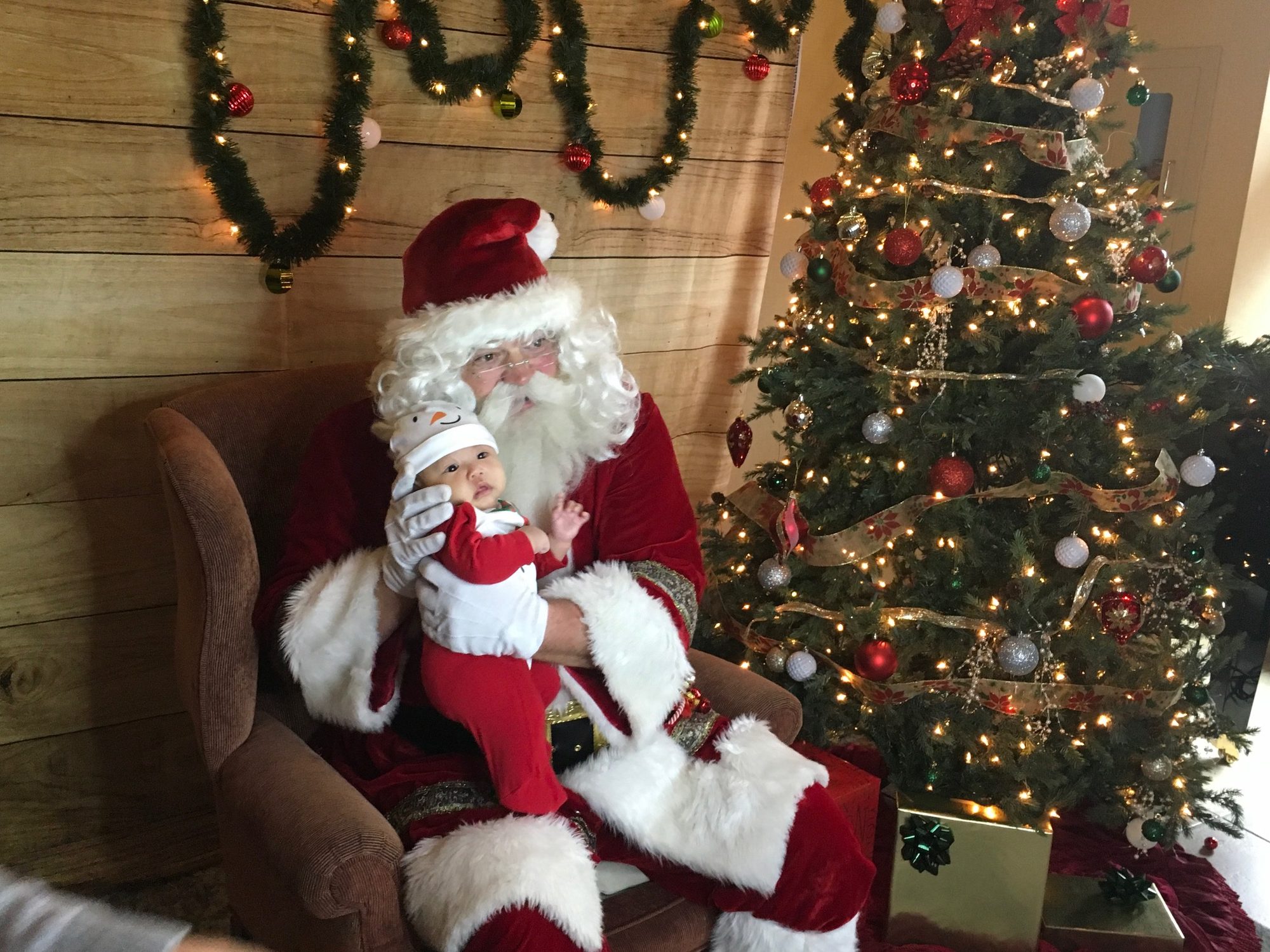 Santa Claus greeting children