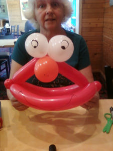 A Face of a Clown Balloon With Eyes and Nose