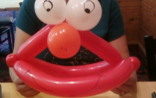 A Face of a Clown Balloon With Eyes and Nose