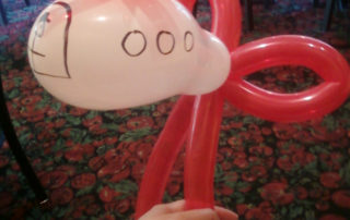 An Airplane Shape Balloon in Red and White