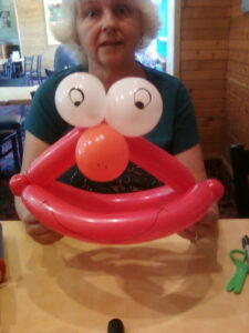 A Red and White Color Balloon Shape