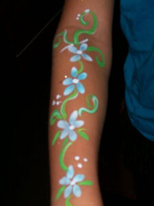 A Little Girl With Floral Themed Body Painting