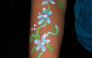 A Little Girl With Floral Themed Body Painting