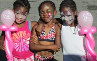 Three Little Girls With Face Paintings on Face
