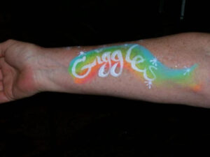 Giggles Word Art in White on a Rainbow