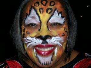 The Front of a Face With Tiger Themed Painting