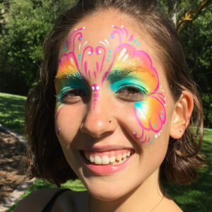 The Face of a Woman With a Butterfly Painting