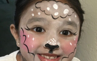 A Girl With a Full Cat Style Face Painting