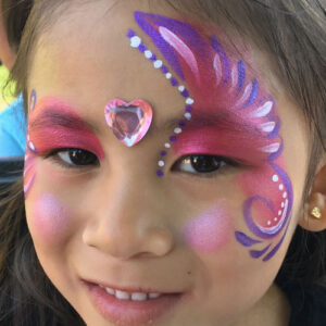 The Side of a Face With a Wing Shape Face Painting